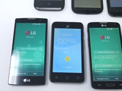Lot of 9 Various Smaller Sized Smartphones – For Parts – Moto / HTC / LG