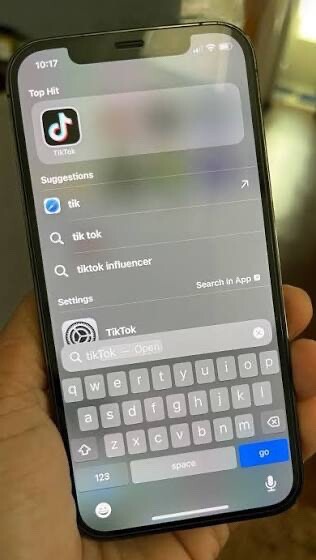 Dark blue iPhone 13 128 GB with TikTok