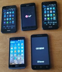 GREAT PRICE! Lot 5-Smartphones LG & Asus *Powers On With Battery Untested! READ