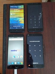 Lot of 4 Mixed model MetroPcs Z981 32GB and other Blue Smartphone For parts