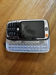 Smartphone (Orange-HTC) Fully Functional. Silver front and black body. Good!