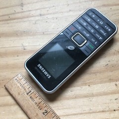 Samsung Black and Sliver SGH-S125G Cellphone 4&Prime;L x 1.5&Prime;W