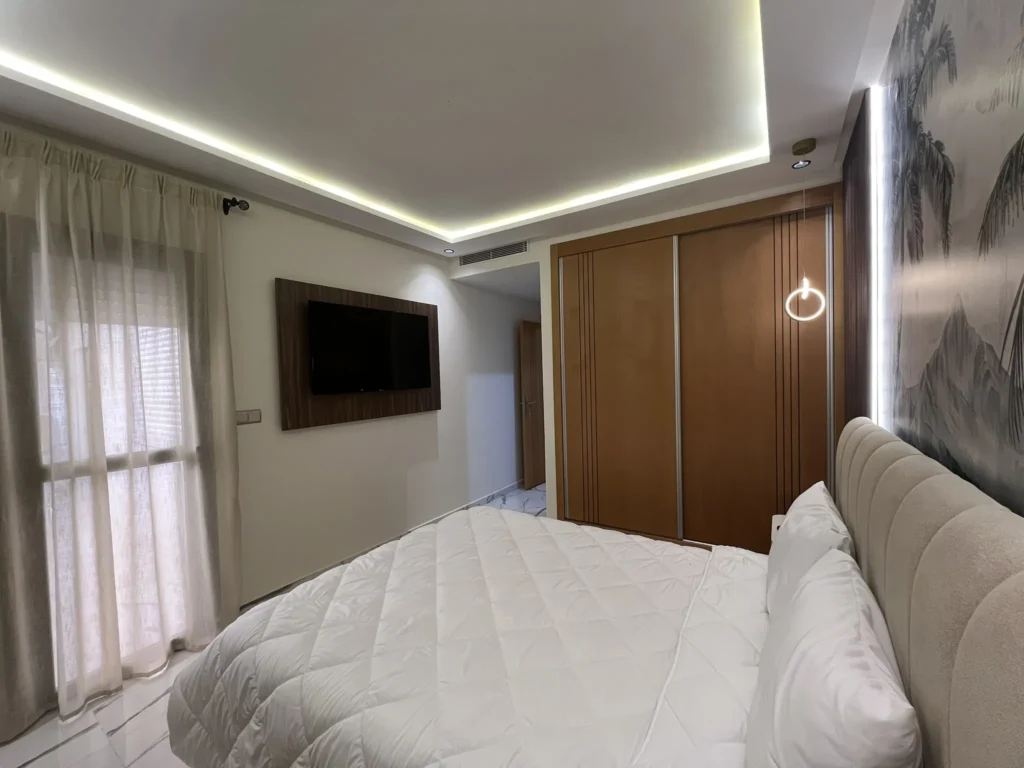 Master bedroom walnut tv wall wood wardrobe