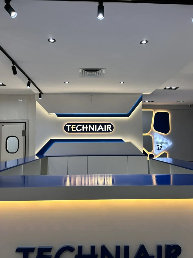 Techniair showroom logo wall reception
